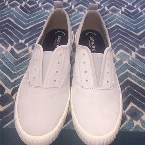 Gray and white Sperry laceless slip-one